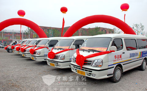 天津“华北城”巨舰启程 金旅客车精心护航