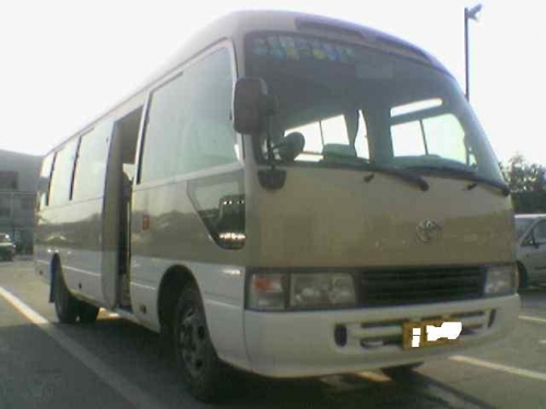 出售05年7月四川丰田考斯特23座非营运上海牌照手续齐全