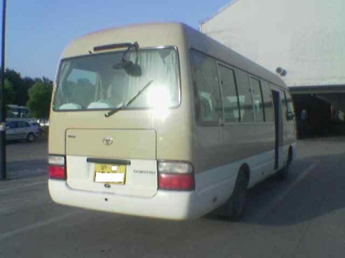 出售2010年四川丰田考斯特23座非营运汽油折叠门沪C牌照